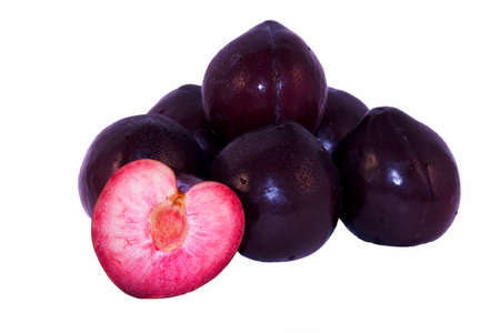 Black Plums Isolated on Whiteの写真素材