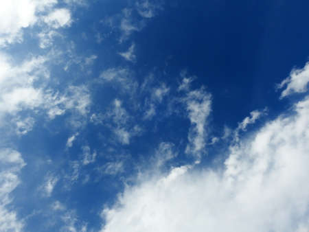 Soft White Clouds and Blue Skyの写真素材