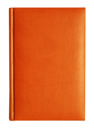 orange leather diary notebook at the white backgroundの写真素材
