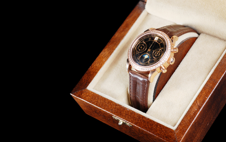 jewelry wristwatch with leather bracelet in wooden boxの写真素材
