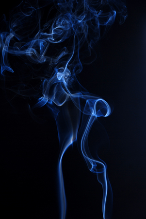 Blue smoke texture at black backgroundの写真素材
