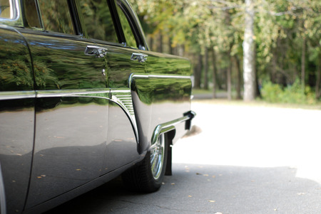 a black luxury limousine on the parkの写真素材