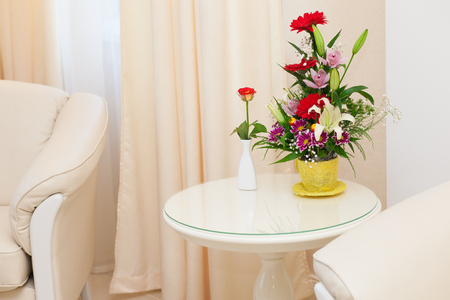Beauty flowers on the tableの写真素材