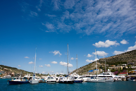 many boats and yachts near the beachの写真素材