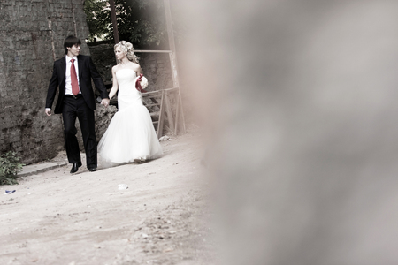Young and cute bride and groom on their weddingの写真素材