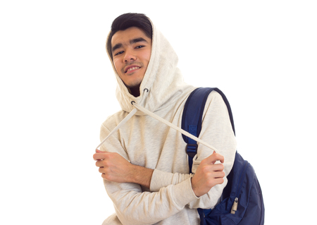 Young man with glasses and backpackの写真素材
