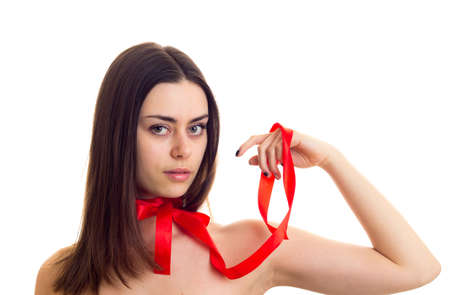 Young woman with red bowtieの写真素材
