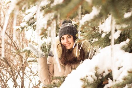 Young woman in winter park