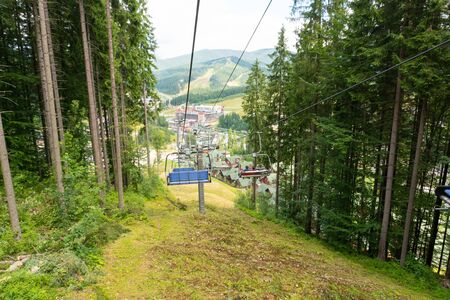 Ski lift in the forest at the mountain