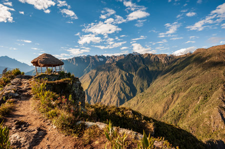 Shelter at sunrise at the top of the Machu Picchu mountain (3,061 m). View of the ancient city of Machu Picchu, Peru. Lost Incan City of Machu Picchu near Cusco, Peru.の写真素材