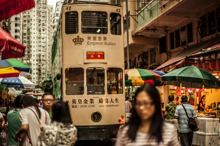 Hong Kong, China - 7 July, 2013: Tram and busy street in the North Point district of Hong Kongのeditorial素材