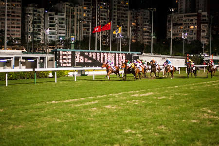 Hong Kong, China - 3 June, 2009: Horse racing at the Happy Valley Racecourse in Hong Kongのeditorial素材