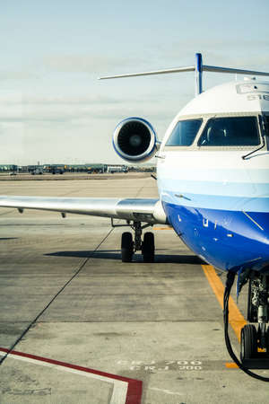 Denver, Colorado - 27 April, 2007: A United Express Bombardier CRJ700 at Denver International Airportのeditorial素材