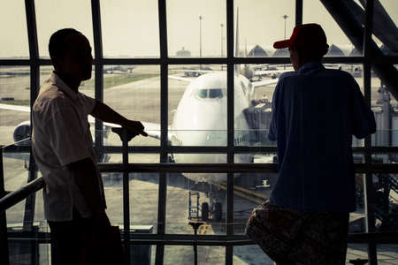 Bangkok, Thailand - 24 February, 2011: Interior of the main international airport terminal in Bangkok during the morningのeditorial素材