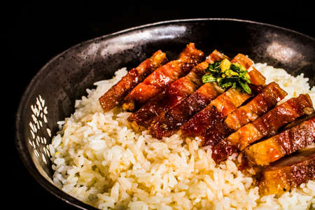 Cantonese food of BBQ red pork (char siu) with riceの写真素材