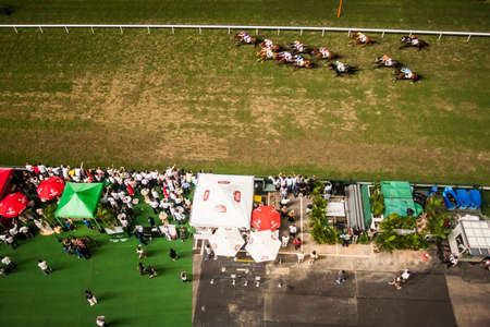 Hong Kong, China - 3 June, 2009: Horse racing at the Happy Valley Racecourse in Hong Kongのeditorial素材