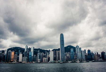 Hong Kong, China - 19 May, 2009: Skyline of Hong Kong from Tsim Sha Tsui, looking past Victoria Harborのeditorial素材