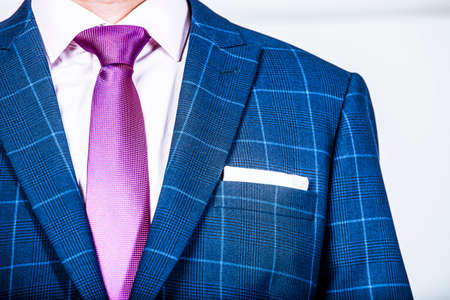 Detail of a blue suit jacket on a young professional businessmanの写真素材