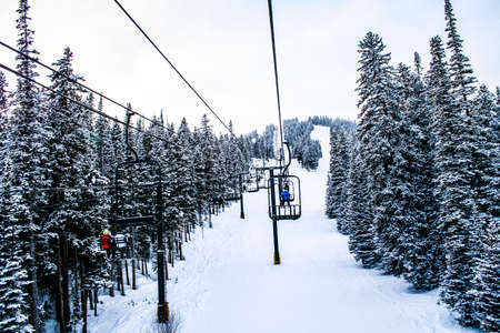 Ski lift on a mountain with snowの写真素材