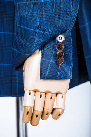 Details of a tailored blue vest on a mannequinの写真素材