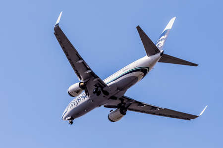Long Beach, California - 11 April, 2009: Alaska Airlines Boeing 737-800 on landing approach to...