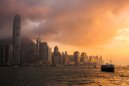 Hong Kong, China - 27 May, 2009: View of the city skyline with the Star Ferry and Victoria Harbour at sunsetのeditorial素材