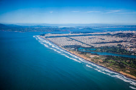 Aerial view of Richmond district and the Golden Gate Bridge in San Franciscoの写真素材