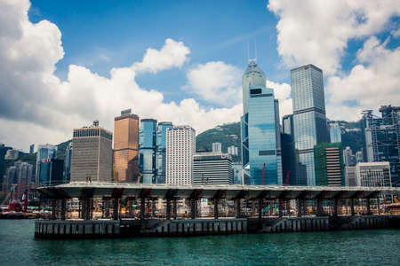 Hong Kong, China - 18 May, 2009: View of the piers in Central district with skyscrapers from...
