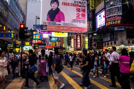 Hong Kong, China - 27 October, 2009: Busy street crossing at Sai Yeung Choi St. in Mongkok district...