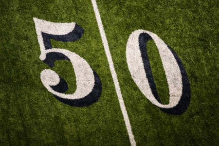 Yard markers on an Americal football field
