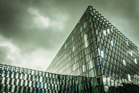 Reykjavik, Iceland - 11 May, 2013: Hapra Concert, a landmark of the city with glass windows, on the waterfront of central Reykjavikのeditorial素材