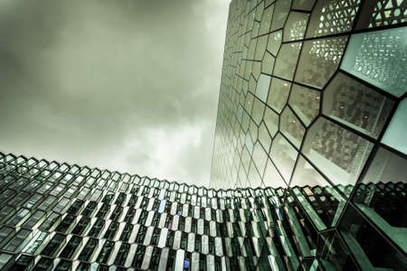 Reykjavik, Iceland - 11 May, 2013: Hapra Concert, a landmark of the city with glass windows, on the waterfront of central Reykjavikのeditorial素材