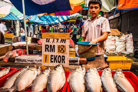 Kuching, Malaysia - 29 November, 2009: Fish for sale at an outdoor market in the center of Kuching during the daytimeのeditorial素材