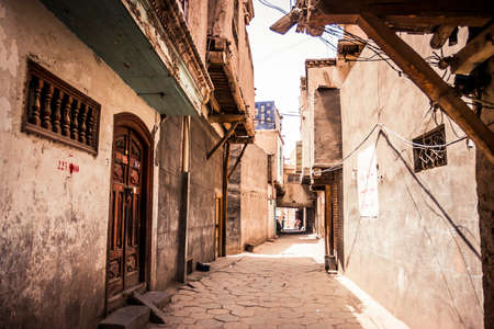 Kashgar, China - 27 June, 2009: Small street in the historic old town district of Kashgar during the...