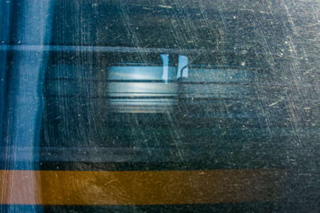 Abstract view of a train passing another at high speedの写真素材