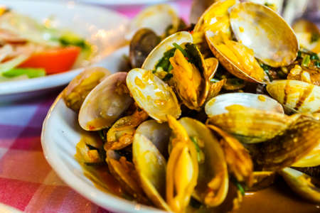 Portuguese style clams served on a white plate in Macau, Chinaの写真素材