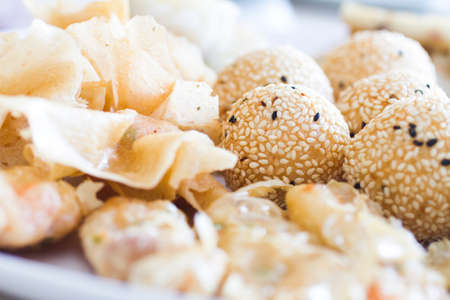 Sesame mochi balls on a plate