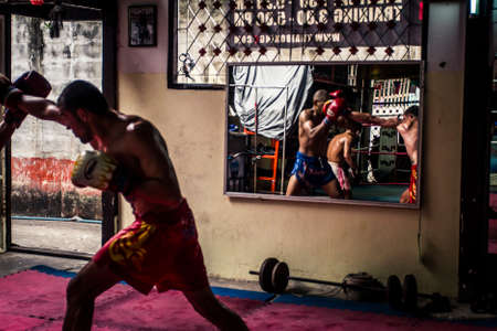 Bangkok, Thailand - 10 June, 2010: Muay Thai boxing complex in the center of the Khaosan district with people training for fightsのeditorial素材