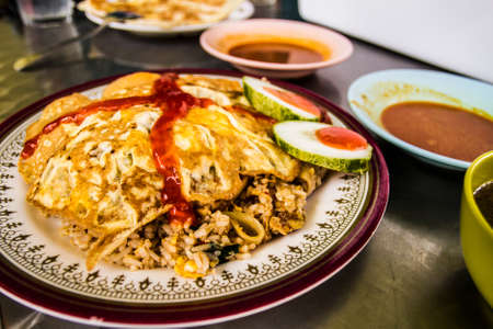 Malaysian dish of Nasi Goreng with egg on top