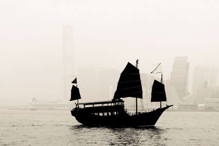 Chinese Junk Boat in the harbour in Hong Kongの写真素材