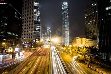 Hong Kong, China - 8 February, 2012: Traffic in Central District  with a view of IFC Two at nighttimeの写真素材