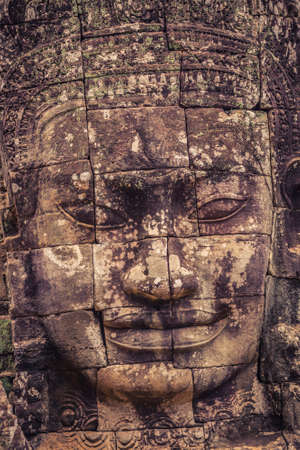 Ancient Ruins at Bayon Temple in Angkor Watの写真素材