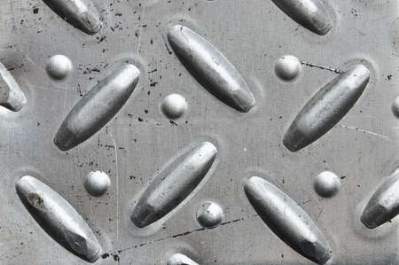 perforated metal backgroundの写真素材