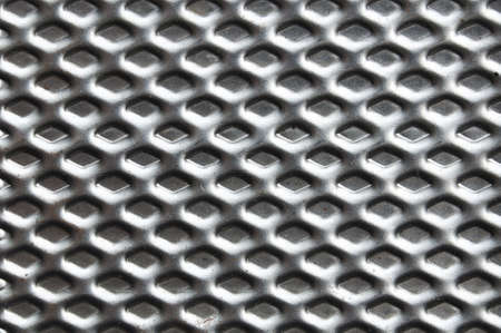 perforated metal backgroundの写真素材