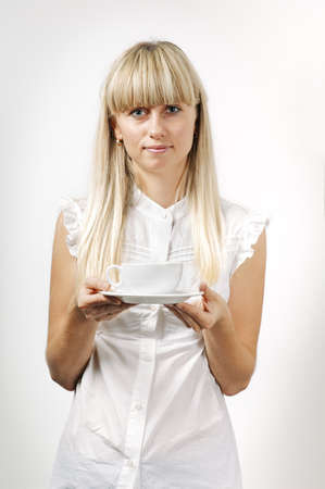 Girl with coffee cupの写真素材