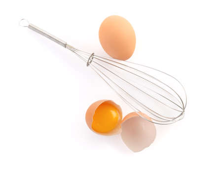 Whisk and Egg on white background with clipping pathの写真素材