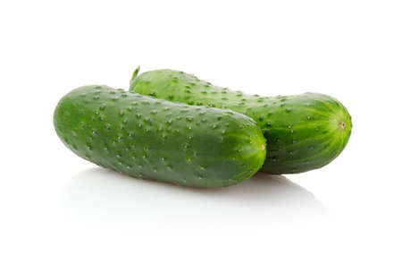 Two fresh Cucumbers isolated on white backgroundの写真素材