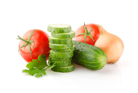 Fresh Tomatoes, Cucumbers, Onion and Parsley isolated on white backgroundの写真素材