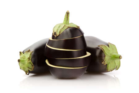 Fresh Eggplant and slices isolated on white backgroundの写真素材