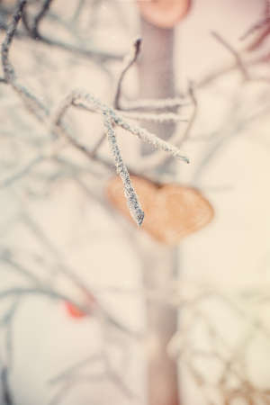 Gingerbread house in christmas landscape surrounded by candy canes and sweetsの写真素材